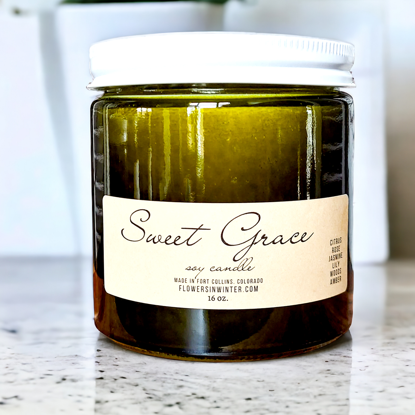 16 oz. Green Glass Container Candle - Flowers in Winter Shop